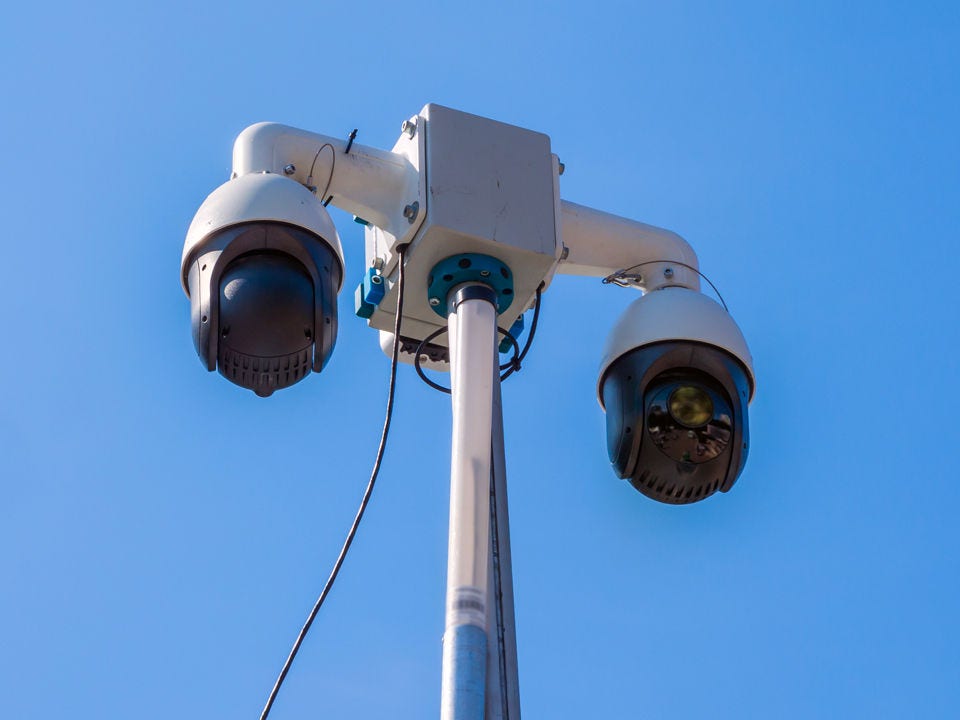 Surveillance camera with blue sky