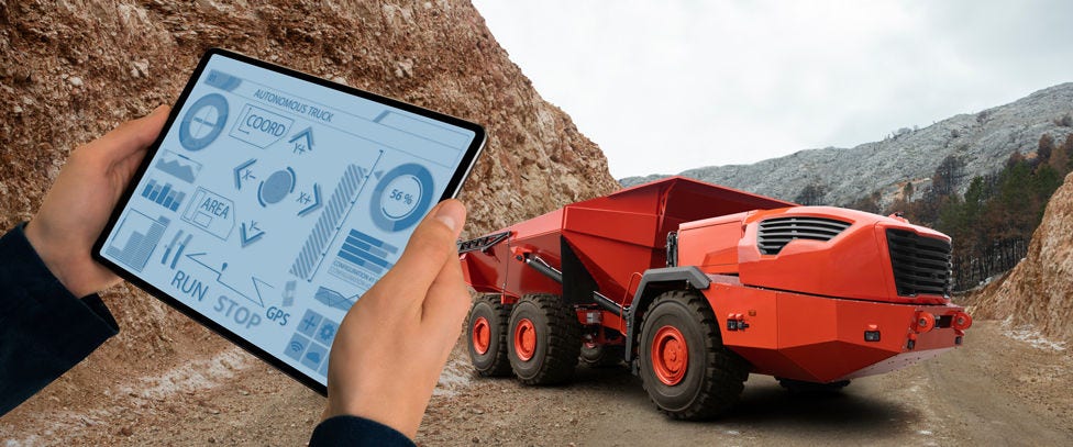 Tablet controlling AMR truck in dirt/muddy mountaintop